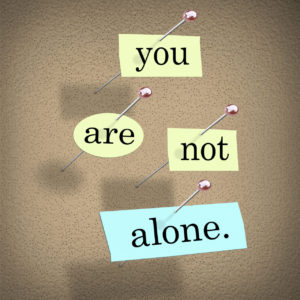 You-Are-Not-Alone-words-on-pap-71955703 C